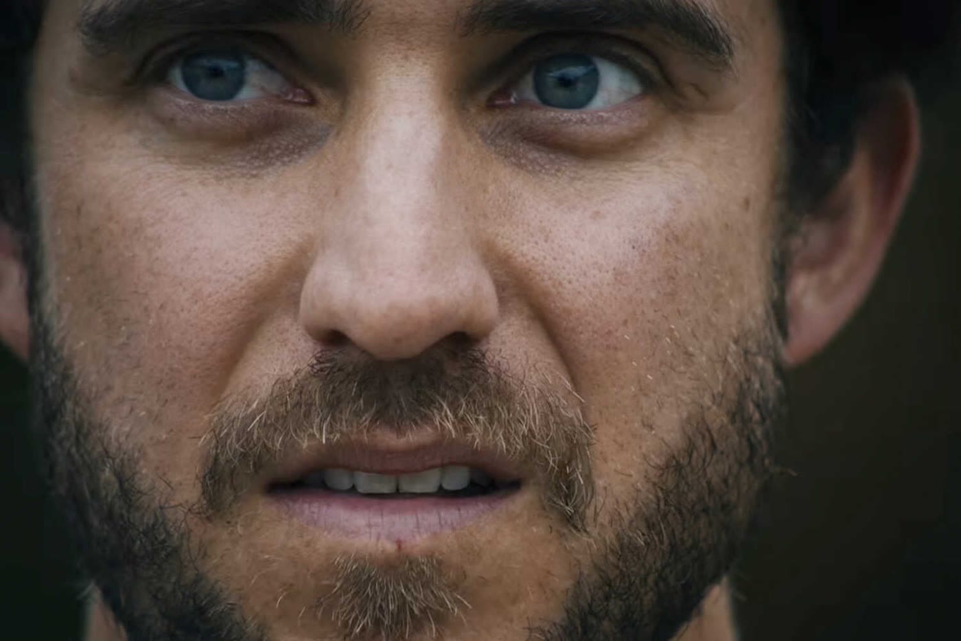 An extreme close-up of Billy Evans, Holmes's partner, in You Can See Everything.